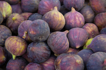Photo from the market square. Fig fruit. Trade and healthy food. Eco food. - obrazy, fototapety, plakaty