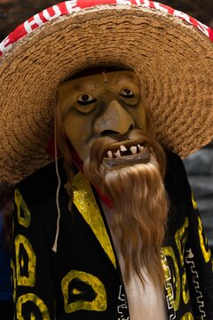Day of the dead man in a mask, careta, framed as a portrait