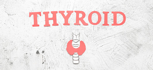 Word THYROID on light background