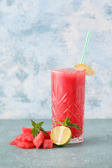 Glass with tasty cold watermelon fresh on color background