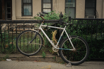 Fototapeta na wymiar Bike on the sidewalk in Crown Heights, Brooklyn, New York