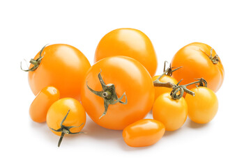 Heap of fresh yellow tomatoes on white background