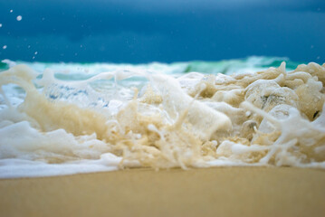 Fototapeta na wymiar ocean waves foam macro 1