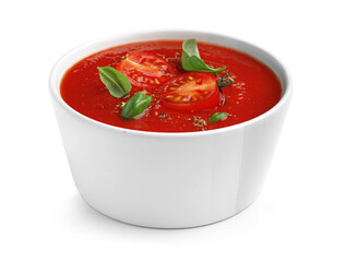 Bowl of delicious tomato soup isolated on white background