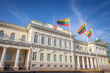 Fototapeta na wymiar Presidential Palace in Vilnius and Lithuanian flags at sunny day, Lithuania