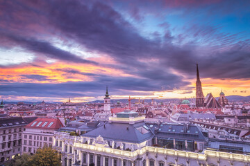 Fototapeta na wymiar St. Stephen's Cathedral and Vienna old town cityscape at dramatic sky, Austria
