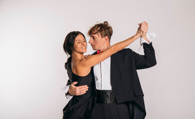 couple dancing. Couple in love. Man and woman posing studio. Photo. Fun. Smiling. Dance. 