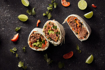 Delicious Burritos and Black Copy space Background For Menu Restaurant or Recipe Text and Advisement.