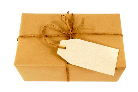 Brown paper parcel and label or gift tag small single one isolated transparent background PNG file