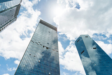 Modern office buildings under cloudy sky