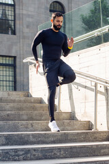 Young athlete running down the stairs 