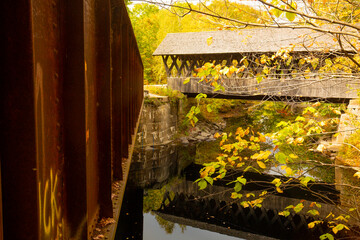 Keniston Covered Bridge in Andover, New Hampshire, with fall colors.