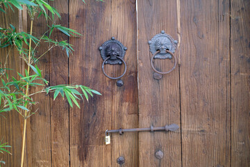 traditional wood door with bamboo