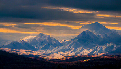 Denali snowy mountain field with beautiful cloudy sky