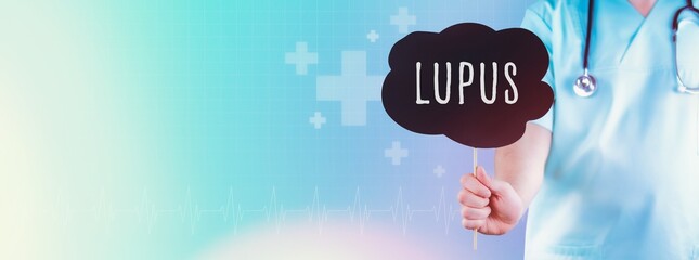 Lupus. Doctor holding sign. Text is in speech bubble. Blue background with icons