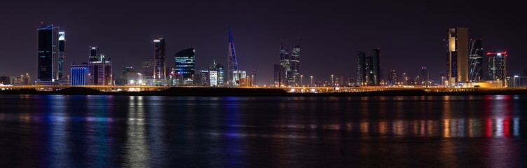 Fototapeta na wymiar Night view of Manama city and its illuminated structures