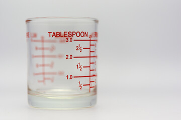 Measuring cup, measuring cup, ounces on a white background.