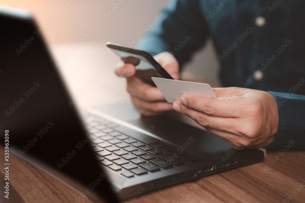 Poster Man using credit card for purchasing and shopping online on mobile phone. Mobile payment with wallet app technology. Digital money transfer, banking and e commerce concept.