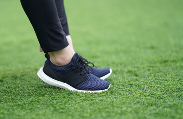 woman prepare run shoes before jogging