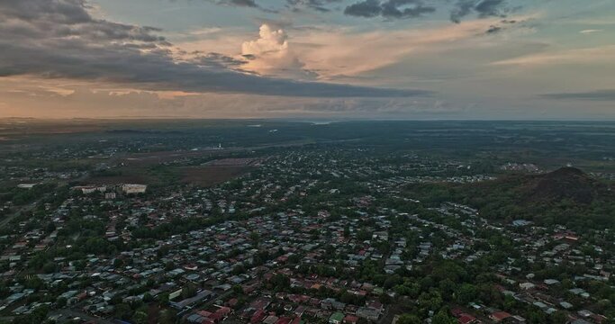 David Panama Aerial v12 flyover barrio el carmen, cinematic panning view capturing cerro san cristobal and townscape of ivu primavera neighborhood at sunrise - Shot with Mavic 3 Cine - April 2022