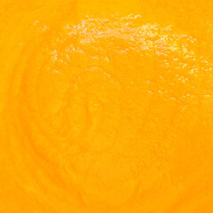 Pumpkin or Squash Cream soup texture as a background. Autumn cream-soup Pattern, wallpaper.