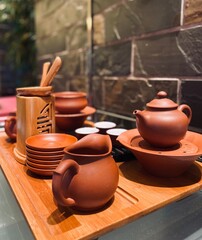 Teapot and cups on the table