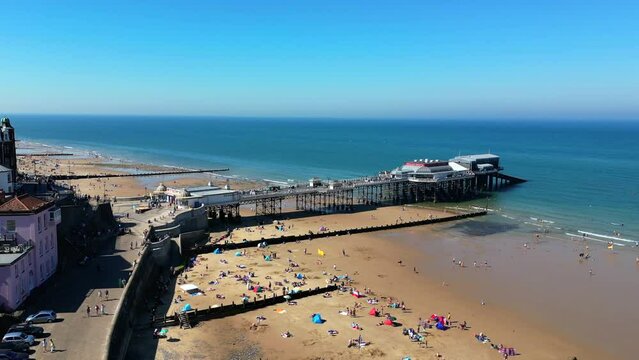 Cromer Pier, Cromer, Norfolk, United Kingdom. View from south beach of the pier and theatre.