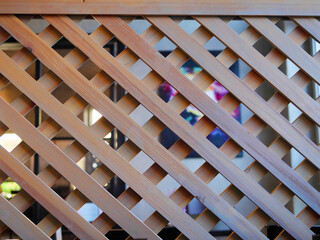 A wooden screen divides the space. Selective focus.