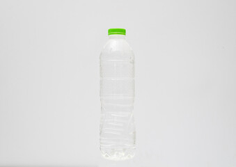 Plastic drinking water bottle on white background
