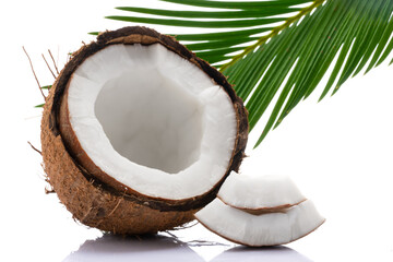 Coconut with leaves on white background