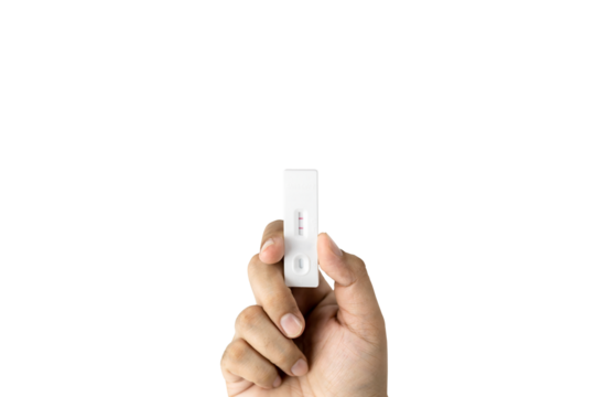 Own hand showing Covid-19 positive test result with SARS CoV-2 Rapid antigen test kit (ATK) with clipping path. with copy space, Coronavirus infectious protective concept.