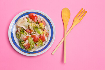Fresh Vegetables Organic Salad With Mixture of Fresh Green Cabbage Leaves and Juicy Tomatoes With Oil Dressing as Helthy Food concepts.