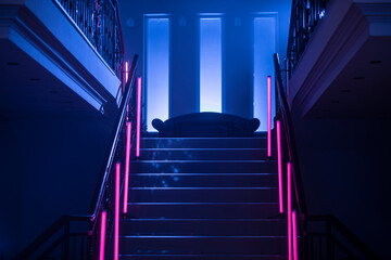 Neon Background. Dark blue and red neon stairs at the night. Night club, bar, concert or studio...