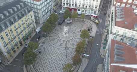 aerial orbit view of monument Luís de Camoes as old as all around the square, causing an extremely beautiful and historical look. Lisbon City.