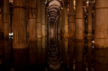 Yerebatan - Basilica Cistern is one of favorite tourist attraction in Istanbul. Noise and grain include. Selective focus column and  pillars