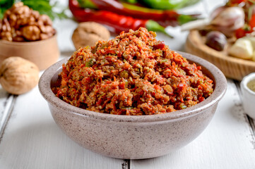Adjika from hot peppers and nuts. Spicy seasoning of Georgian cuisine