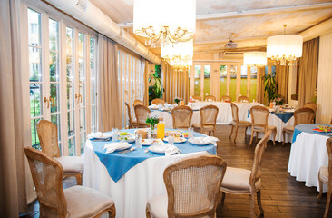 Banquet in the restaurant, serving tables, appetizers, sets