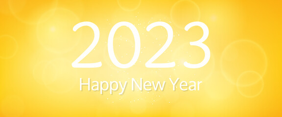 Happy new year 2023 incription on blurred background