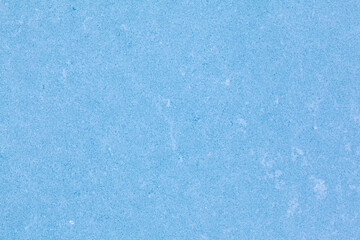 Fototapeta na wymiar Texture of winter ice surface. Blue natural ice background