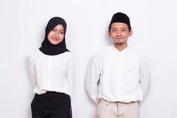 portrait young asian muslim couple welcoming guests and gretting 