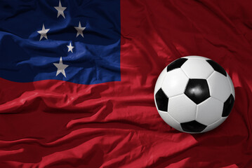 vintage football ball on the waveing national flag of Samoa background. 3D illustration