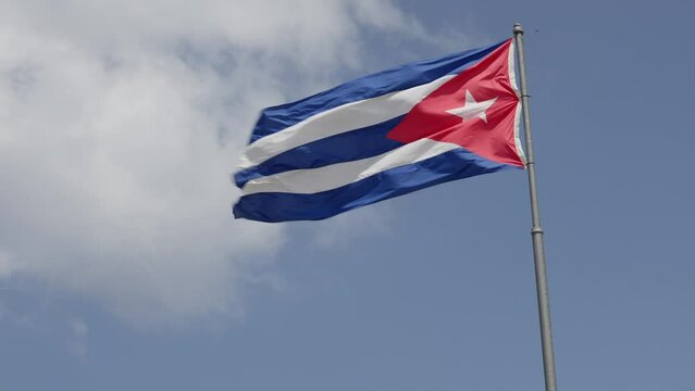 Cuban National Flag waving in a sunny day - Slow Motion 