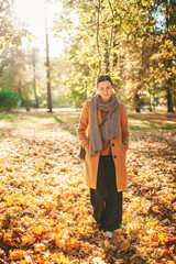 Woman in the autumn park