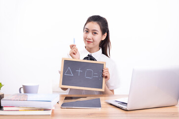 Asian female students taking an online class against a white background