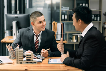 Sales giving male customer signing sales contract, Asian woman and man doing business in office, business concept and contract signing...