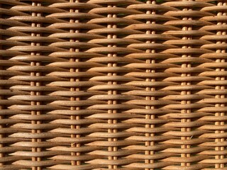 a beige braided rattan pattern