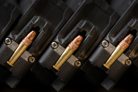 Rimfire 22lr ammo loaded into magazines. macro view.