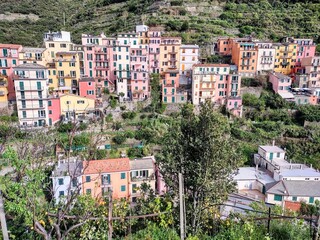 Fototapeta premium Seacoast of Cinque Terre with its villages and nature in Italy during a gloomy day of spring