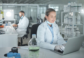 Science woman, expert and laptop laboratory research, medical innovation and biology test online. Senior analytics scientist, desktop data and physics worker planning digital tech internet analysis