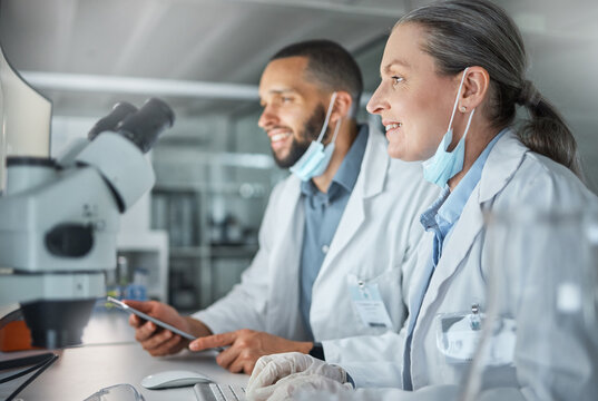 Teamwork, Science And Scientist Working On Covid Research, Biotechnology And Dna Data Analysis Together In Laboratory. Smile, Collaboration And Happy Woman Reading Medical Information With A Partner